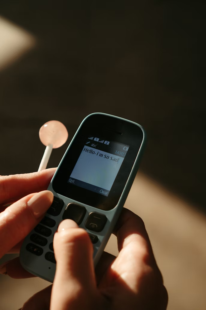 Glitchy mobile phone displaying a crypto wallet